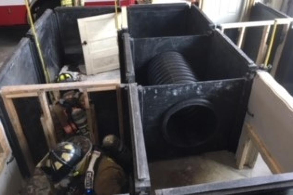 Firefighters continuing through the wall (2)