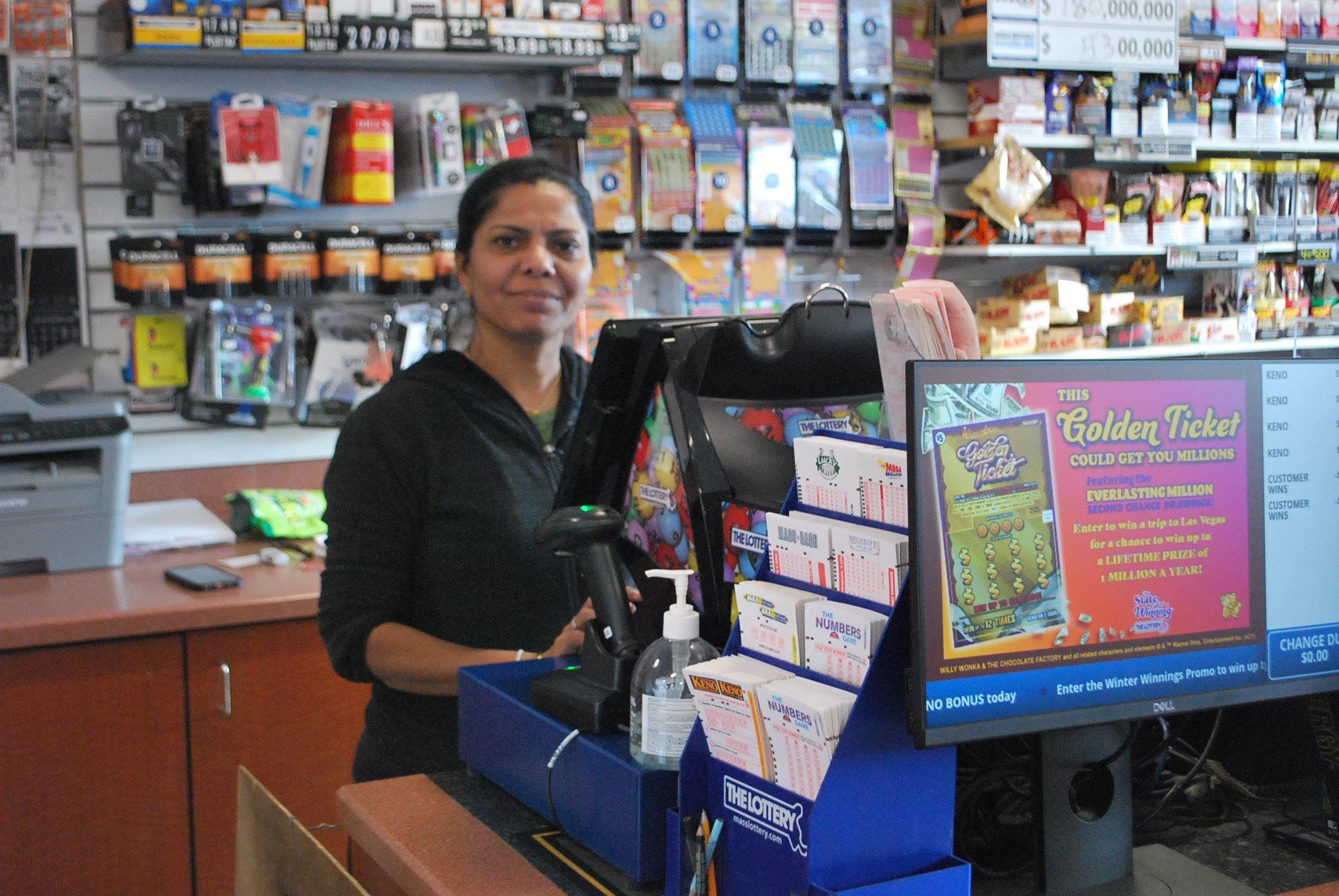 Bhavna Patel behind the counter at Jimmy's Convenience Store
