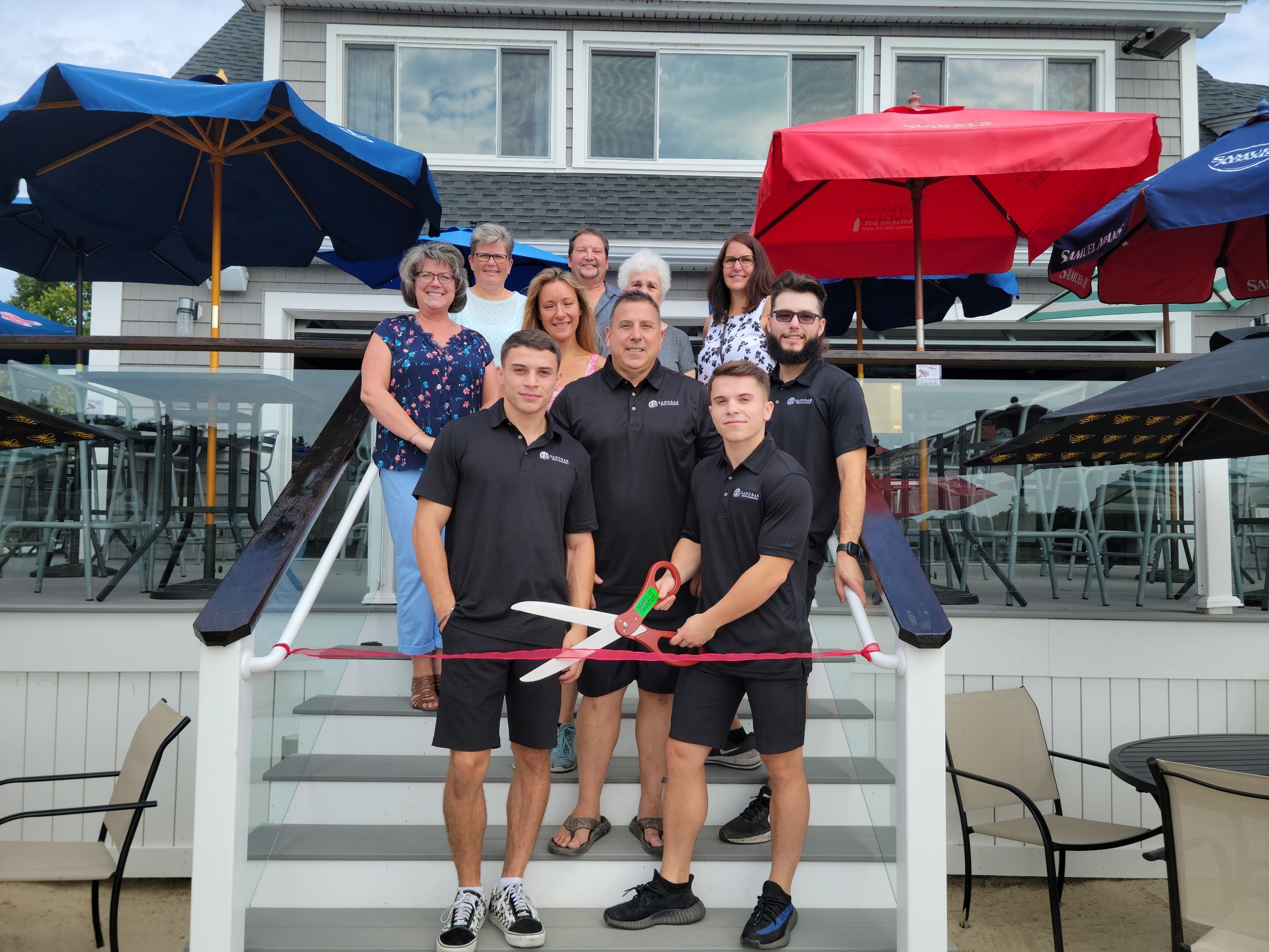 Ribbon-cutting ceremony for The Sandbar Beach Club