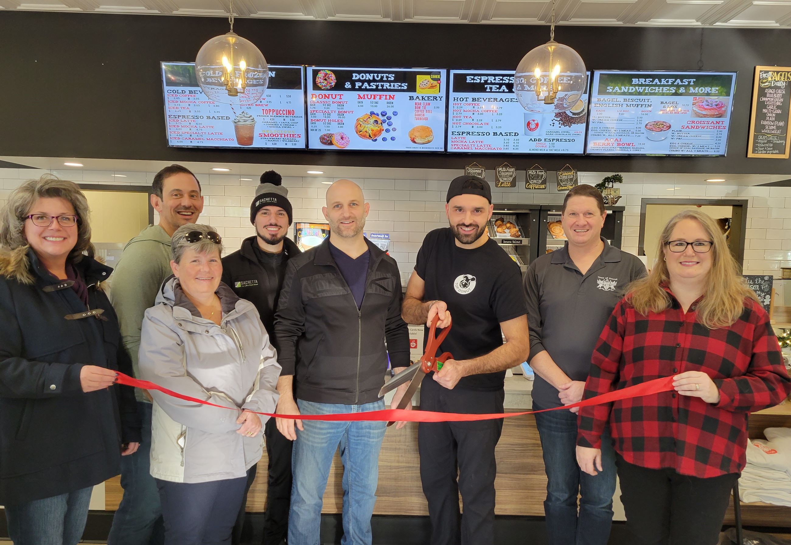 Ribbon-cutting ceremony for Top Donut's new owners