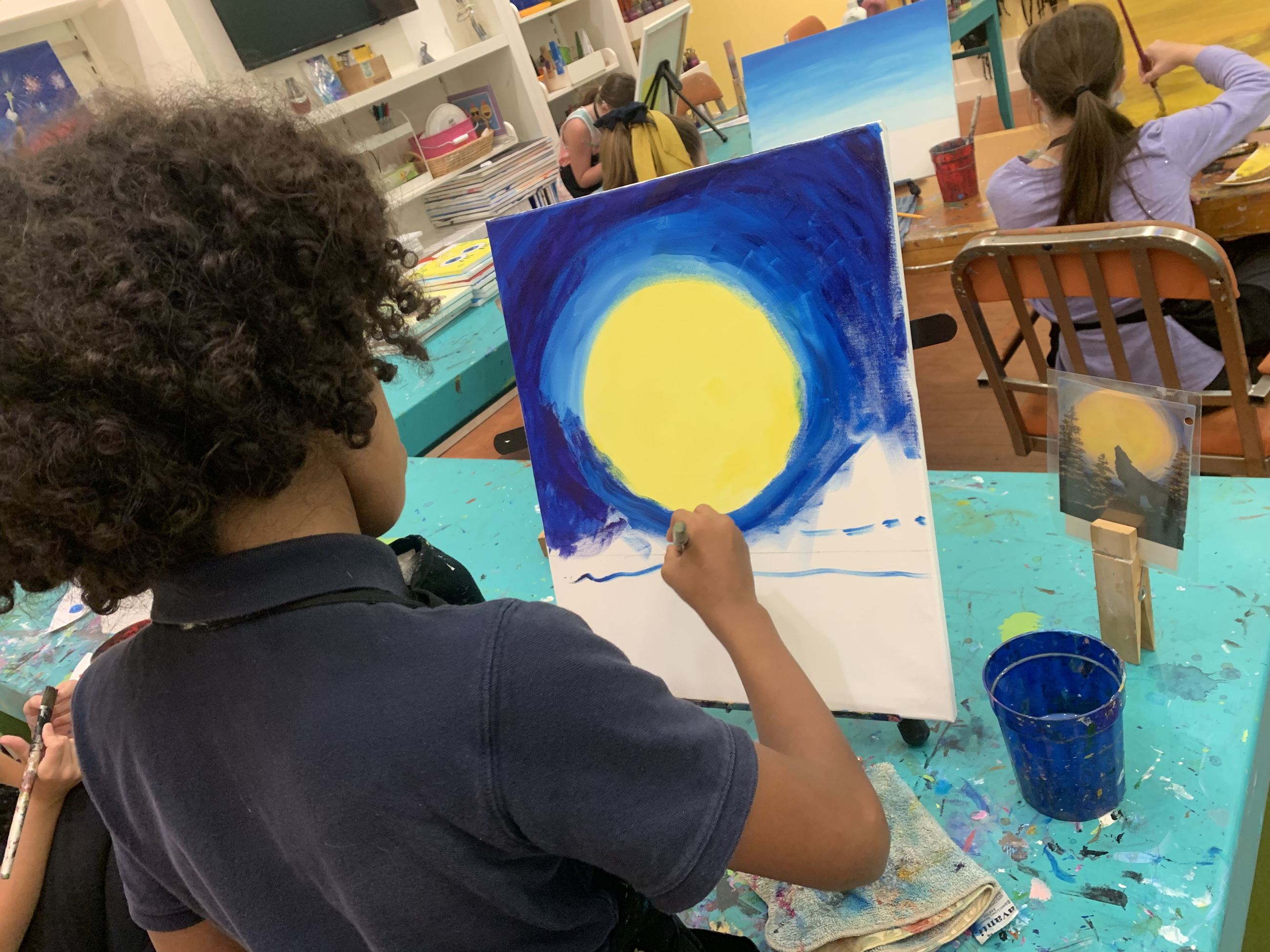 A student paints at Hammar’s Studio in Dracut. (COURTESY HAMMAR’S STUDIO)