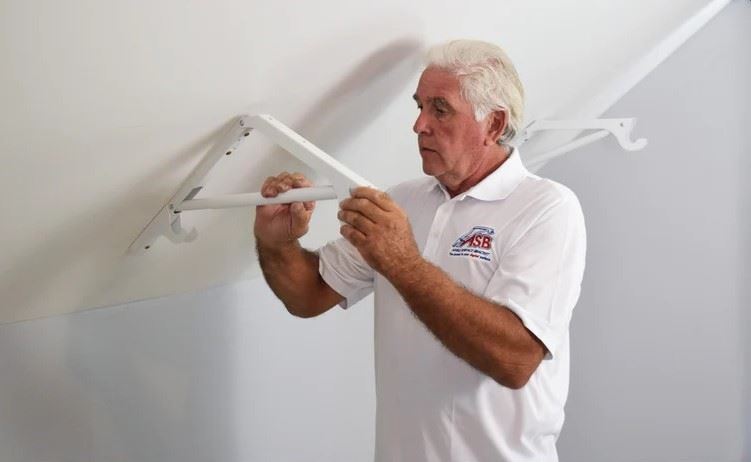 Warren Ignacio installs an Angle Surface Bracket. (COURTESY WARREN IGNACIO)