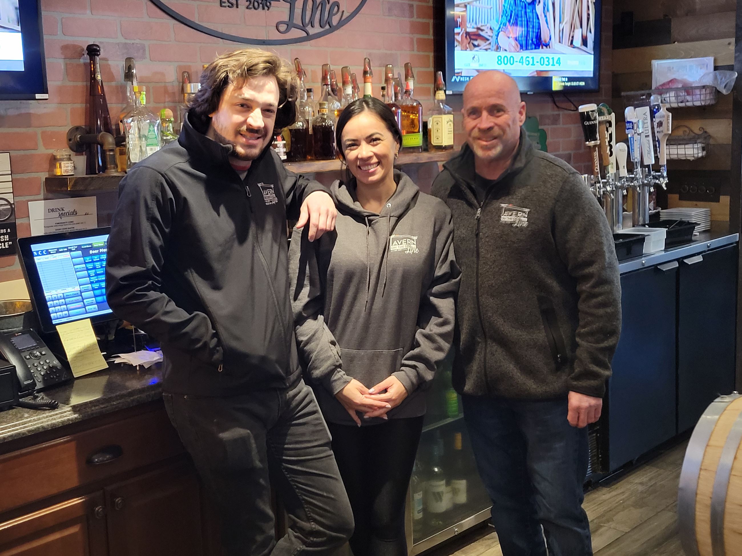 Kevin Forster, Maya Johnson and Joe Forster hold down the fort at Tavern on the Line.
