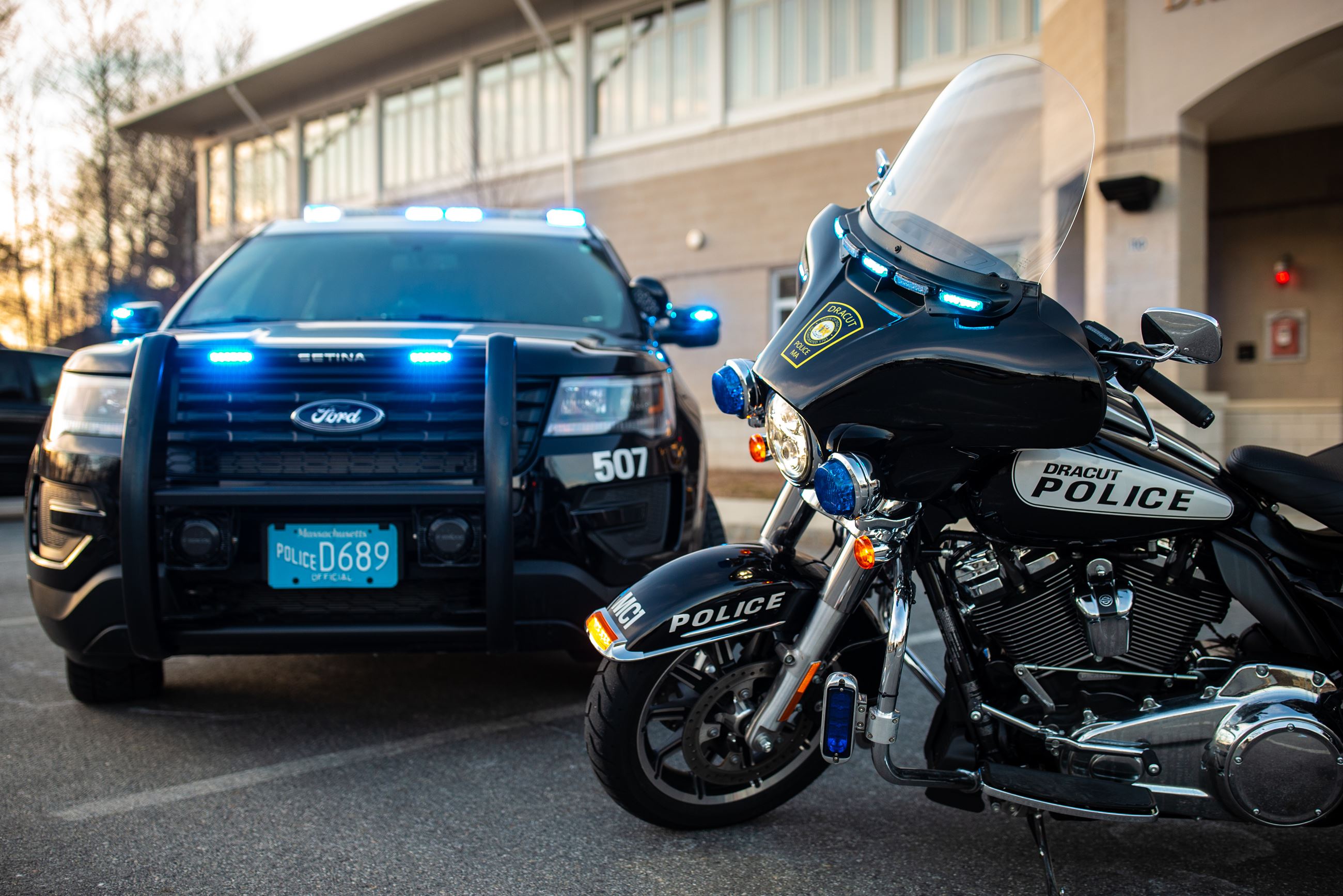 Police cruiser and motorcycle